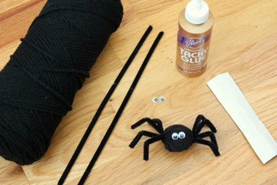 Yarn-Wrapped Spiders Halloween Art and Craft